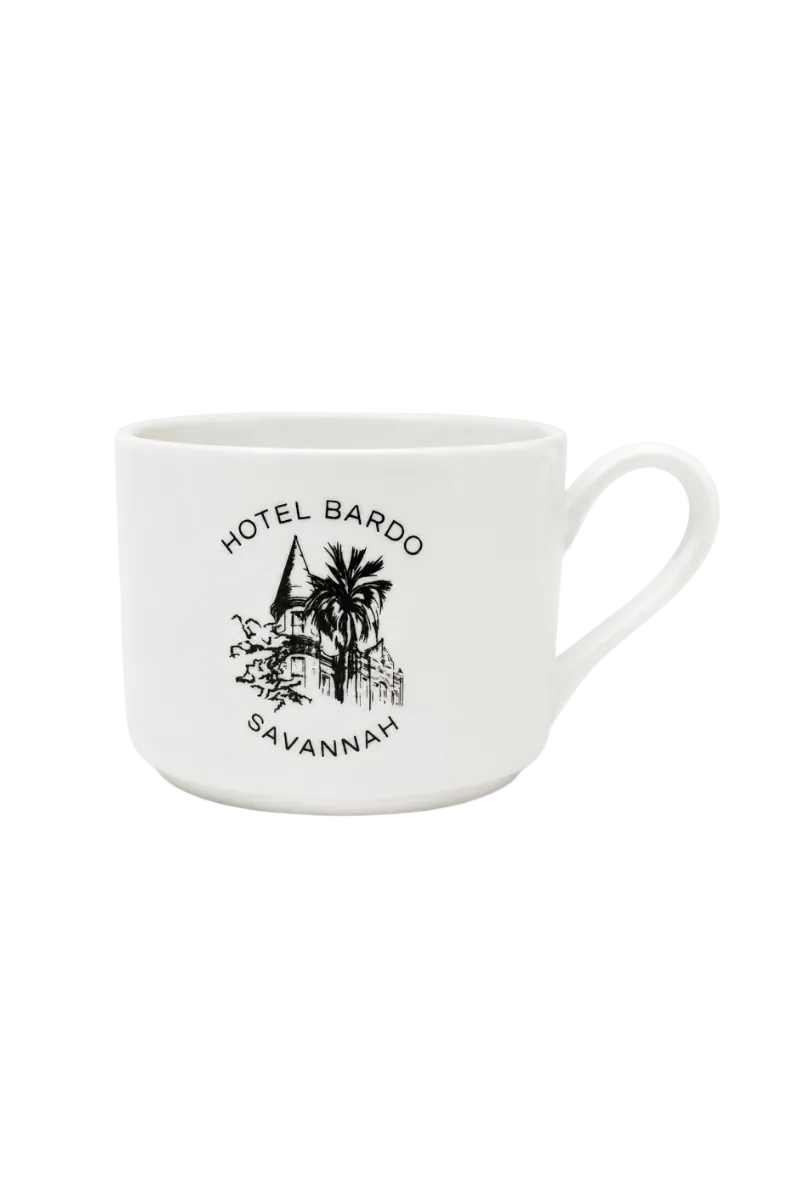 White ceramic mug with the Hotel Bardo Savannah logo on the front in green, on a white background.